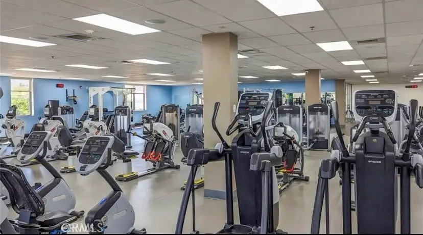 Fitness center in Leisure World Seal Beach featuring modern exercise equipment and spacious layout, promoting active lifestyle for 55+ community residents.