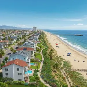 Coastal view of Seal Beach highlighting beach homes and community activities