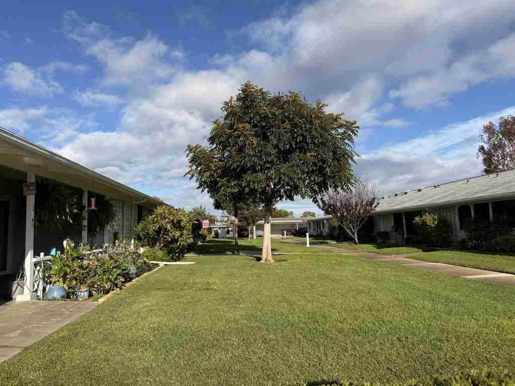 Mutual 5 home in Leisure World, Seal Beach, California, with well-maintained lawn and landscaping.