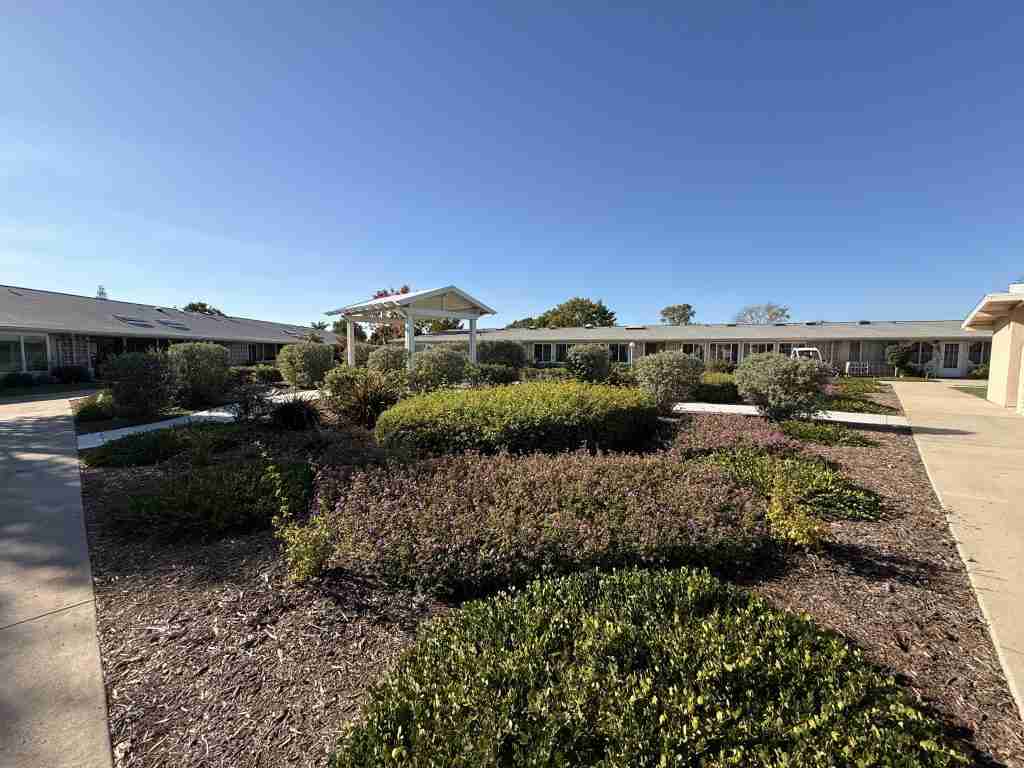 Landscaped courtyard and homes in Leisure World Seal Beach, CA community.