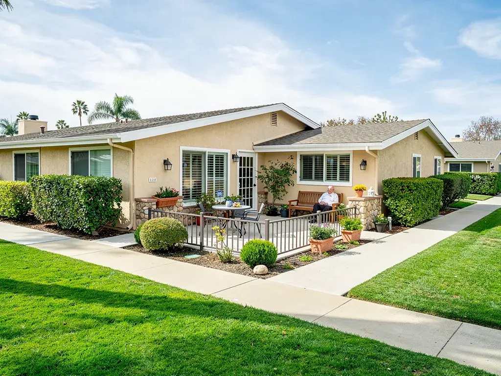 Attractive Mutual 12 patio area with landscaping and seating, illustrating exclusive use patio rights in